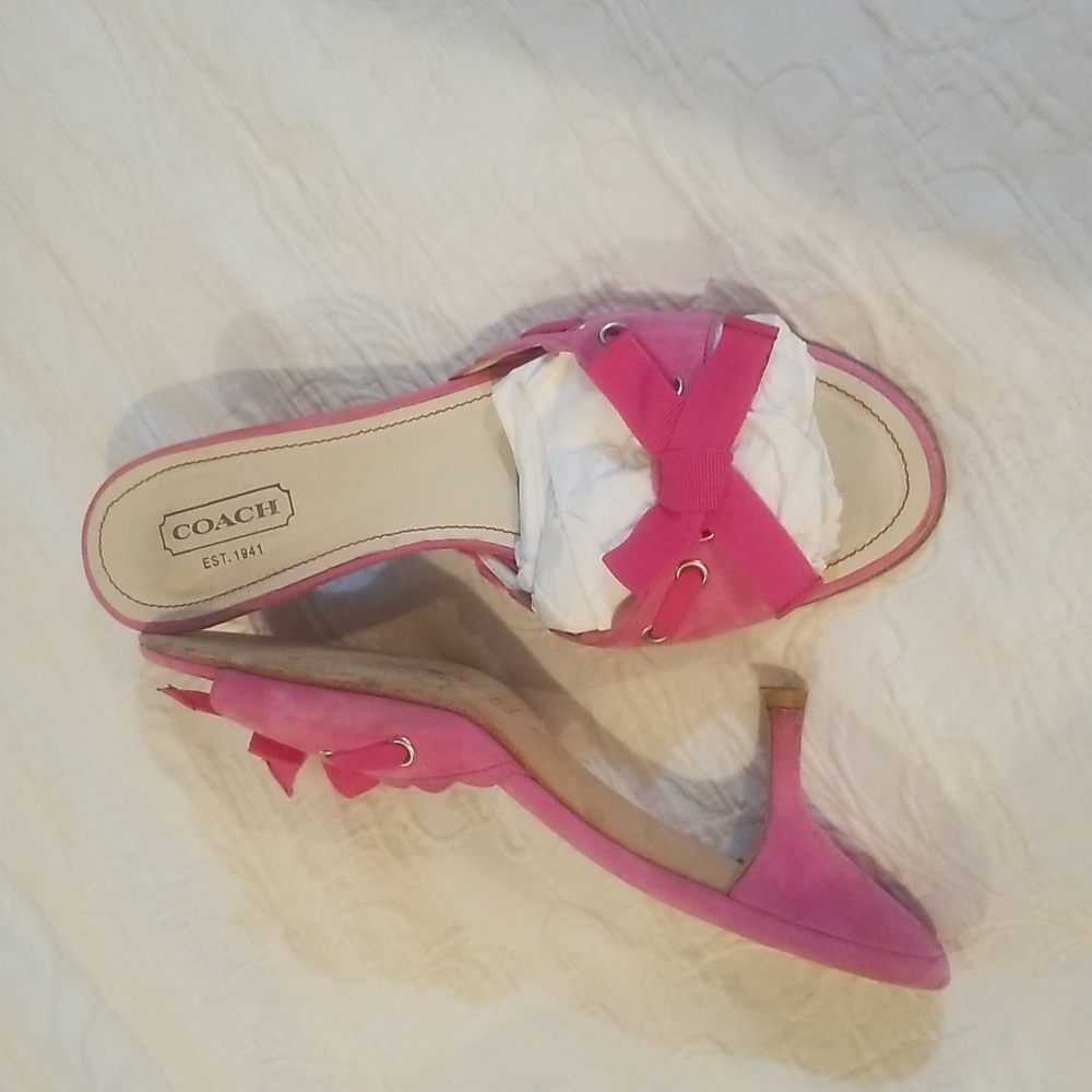 Coach pink slip on